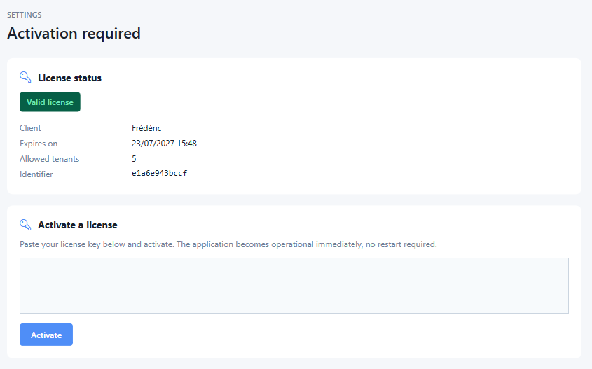 Activation screen showing licence status with client name, expiry date, allowed tenants and identifier, plus a field to paste a new key